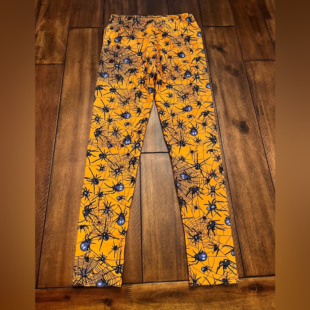 Halloween! Lularoe Leggings “one size”.  Lightly used. Orange with blue spiders.